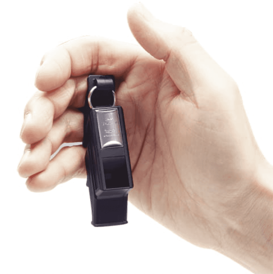 Referee whistle MOLTEN Valkeen RA0030-KS held in hand